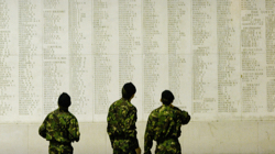 Soldiers reading names